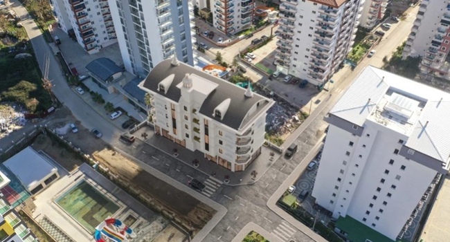 Новая двухкомнатная квартира на берегу моря в Турции по цене «вторички»